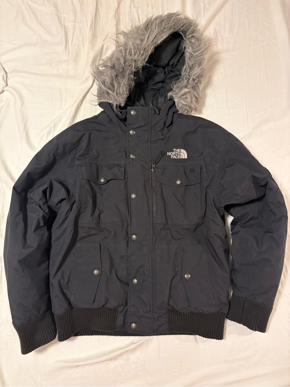 The North Face Men's Black Hooded Puffer Jacket with Faux Fur Trim